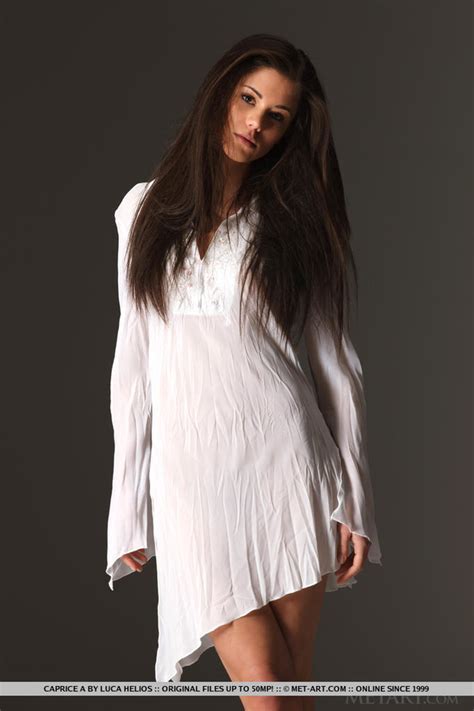 Saucy Doe Eyed Brunette Shows Her Snatch Wi XXX Dessert Picture