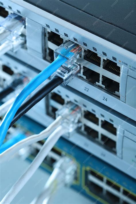 Premium Photo Ethernet Cables Connected To Network Switch Close Up