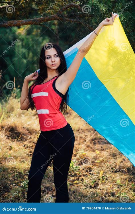 Beautiful Brunette Model Posing In A Park With Flag Of Ukraine Stock Photo Image Of Brunette