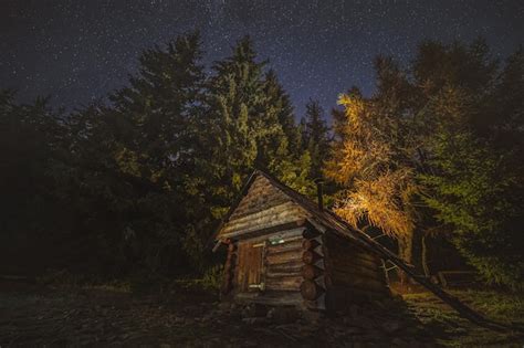 Premium Photo Mountain Night Landscape With Night Sky Wooden Hut