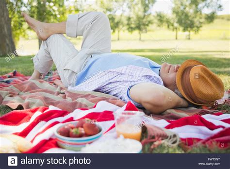 Mature Man Lying Hands Behind Head Hi Res Stock Photography And Images