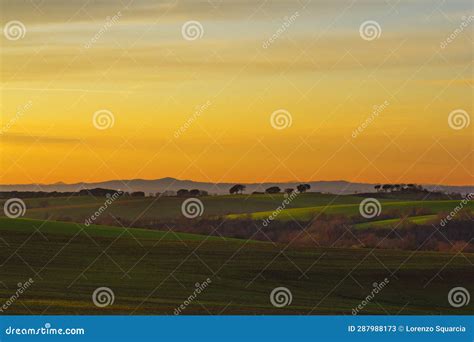 Sunset and green hills stock image. Image of cloud, sunrise - 287988173