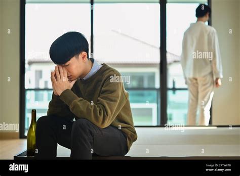 Sad Crying Gay Man Sitting On Bed Ignoring Offended Man After Quarreling Lgbtq Relationship