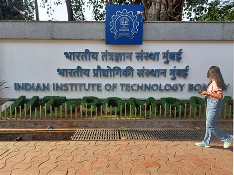 indian institute  technology bombay entrance gatewith girl walking