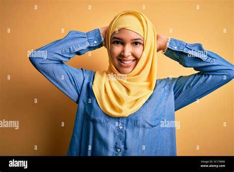 Young Beautiful Woman With Curly Hair Wearing Arab Traditional Hijab
