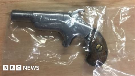 Australian police find loaded gun in biker's bottom - BBC News