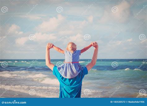 Father And Little Daughter On Shoulders Play At Sky Stock Photo Image