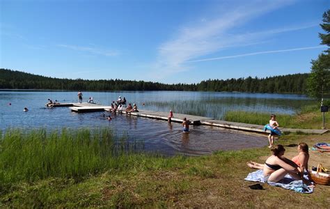 Valkeajärvi Lake swimming beach in Ritavaara holiday center in Pello ...