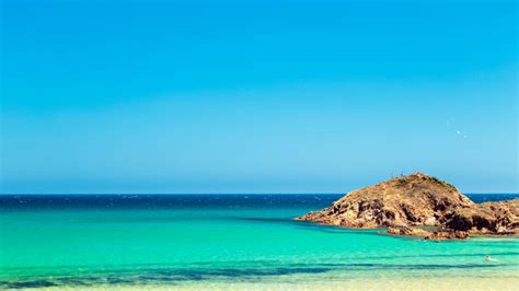 Spiaggia Su Giudeu Foto Come Arrivare E Hotel Nei Dintorni