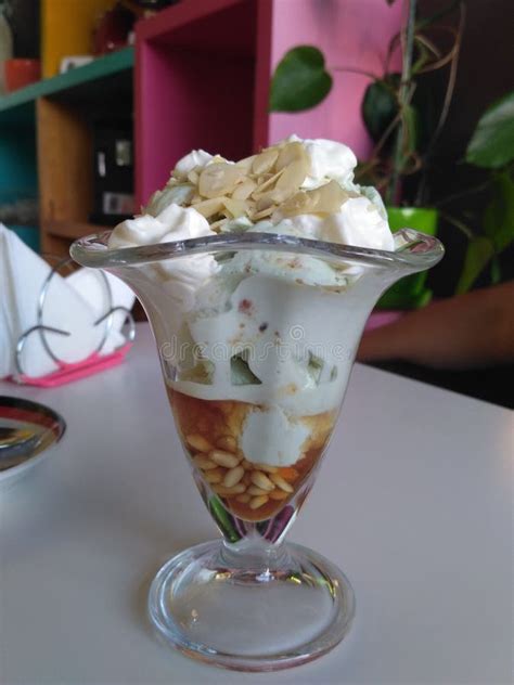 Vanilla Ice Cream With Pine Nuts Stock Photo Image Of Cuisine Glass