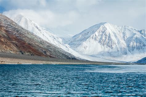 premium photo pangong lake  pangong tso  snow mountain range