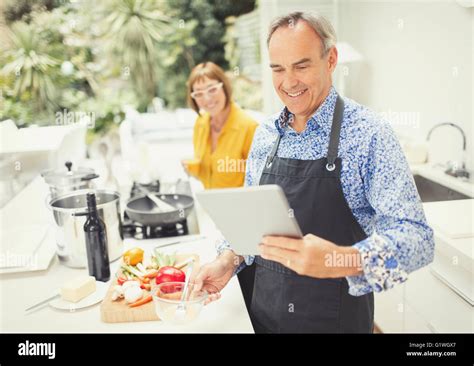 Mature Woman Cooking Kitchen Hi Res Stock Photography And Images Alamy