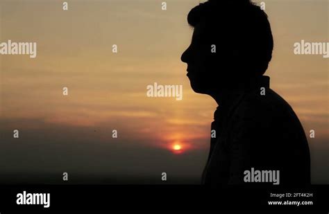 Man praying sunset Stock Videos & Footage - HD and 4K Video Clips - Alamy