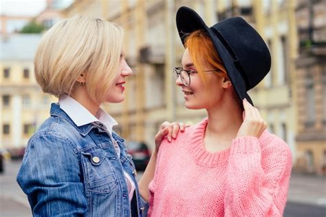 Premium Photo Two Cheerful Same Sex People In Love Walking Outdoors In Europe