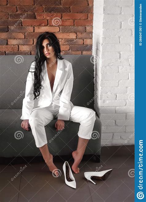 Brunette With Long Hair Posing At A Table In A Cafe Stock Image Image Of Checkered Jacket