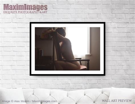 Art Print Of Artistic Nude Portrait Of A Beautiful Woman Sitting Naked Facing Armchair Backrest