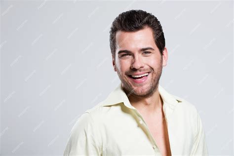 Free Photo Fashion Portrait Of Handsome Happy Man In Yellow Shirt Poses