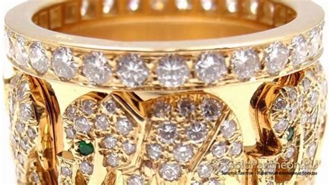 Кольцо со слонами из желтого золота с изумрудами и бриллиантами Cartier ...
