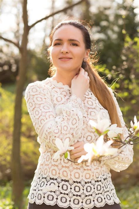Pleased Brunette Model With Nude Makeup Wearing Lace Blouse Po Stock Photo Image Of Park