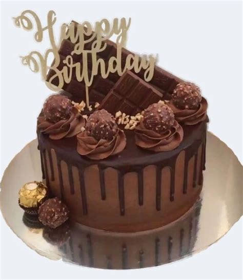 Send Chocolate Drip Cake With Rochers To Guwahati Online With Petalscart