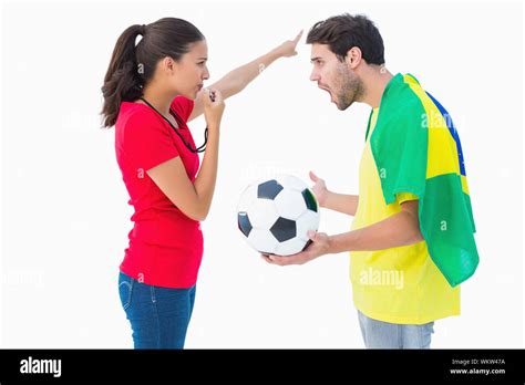 Brunette Sending Off A Brazilian Fan On White Background Stock Photo