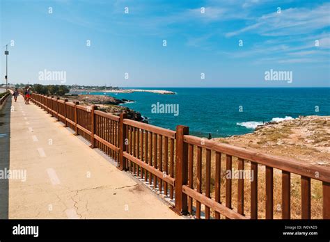 Wide View From Above Of The Adriatic Coast Of Polignano A Famous