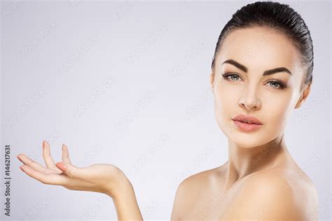 Beautiful Girl With Nude Make Up At Studio Background Stock Photo Adobe Stock