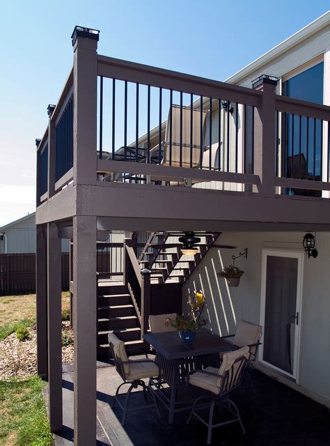 Brinkman Cedar Deck In Kc With Stamped Concrete Patio And Fire Pit