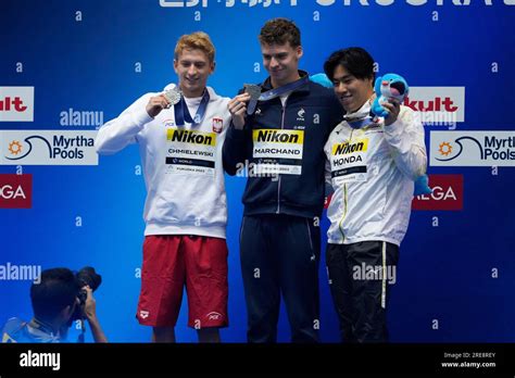 Medalists From Left To Right Krzysztof Chmielewski Of Poland Silver