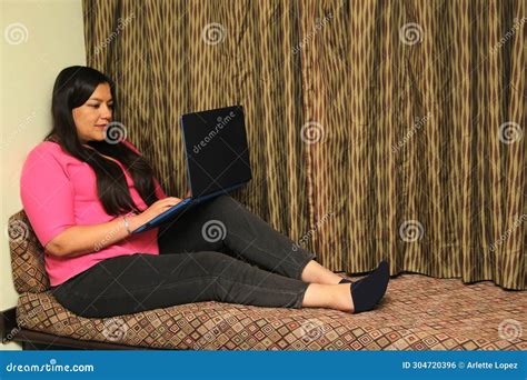 Year Old Latina Woman Uses Her Laptop Computer To Work Make Video Calls Send Messages Make