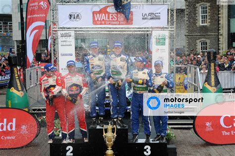 Podium L To R Second Place Finishers Sebastien Loeb FRA And Daniel