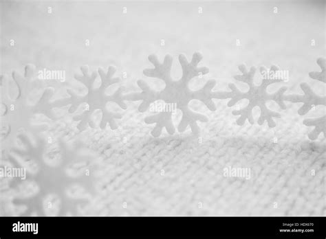 White Snowflakes Are On The Knitted Background Stock Photo Alamy