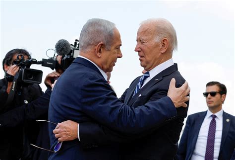 Biden lands in Israel, hugs Netanyahu and Herzog on tarmac | Reuters