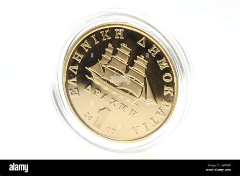 special gold issue of the Greek 1 Drachma coin isolated on white ...