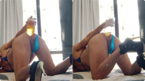 Sissy In Micro Bikini Getting Herself A One Liter Beer Anal Enema In Front Of The Open Window