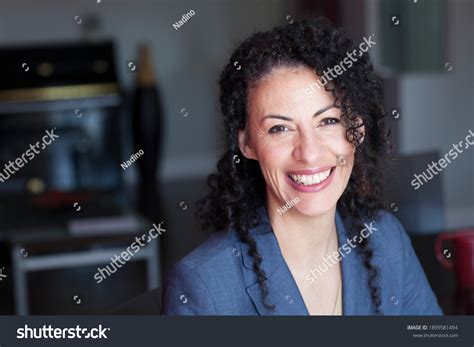 Mature Ethnic Woman Smiling Camera Stock Photo Edit Now 1899581494