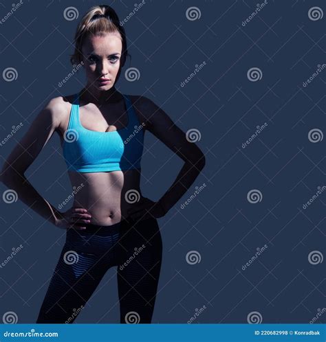 Portrait Of Sweaty Blonde Woman Take A Break After Intense Workout Royalty Free Stock Image
