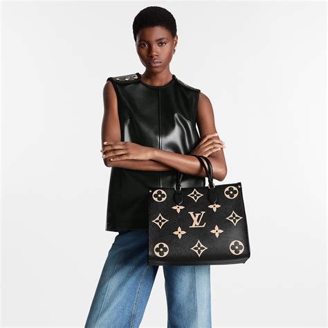 Onthego Mm Bicolor Monogram Empreinte Leather Mothers Day T Guide Louis Vuitton