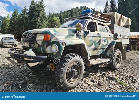 Camouflage Tuned Volga GAZ 3110 Car Customized As A Monster Truck On