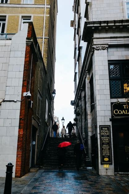 Premium Photo Narrow Alley With Stairs In Town Photo