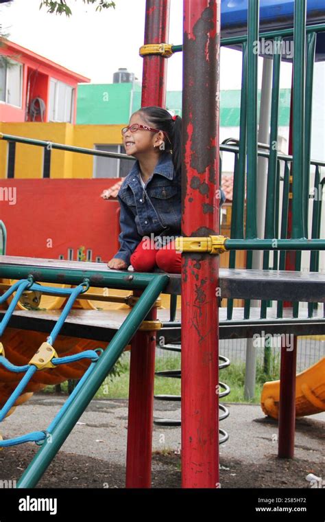 Year Old Latina Brunette Girl With Eye Glasses Plays In The Park Games In Loneliness And