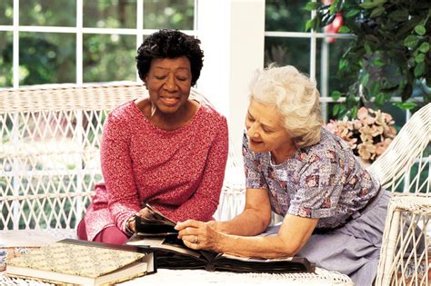 Senior Women Looking At Photo Album Free Photo Download Freeimages