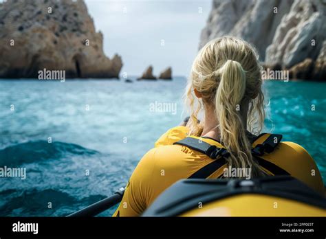 Kayaking In The Pristine Waters Of Costa Brava An Adventurous Blonde Woman S Journey Stock