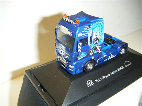 Herpa Man Tgx Xxl Zugmaschine In Pc Vitrine Trio Trans Showtruck