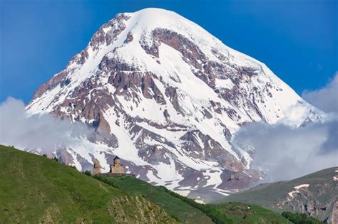 Premium Photo | Kazbek or Kazbegi mountain,near the Gergeti Trinity ...