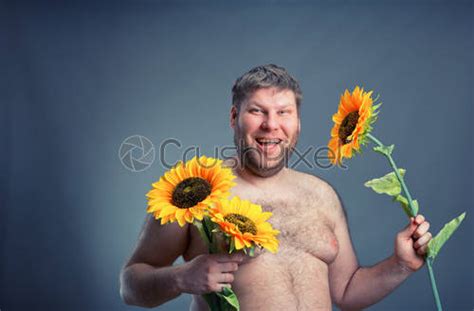 Nude Man In Green Field With Sunflowers Stock Photo 1406334 Crushpixel