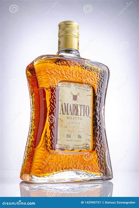 Bottle Of Amaretto Liqueur On Gradient Background Editorial