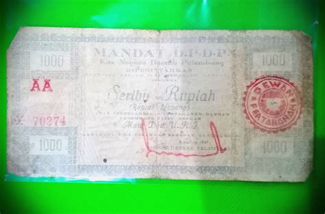 tafsir mimpi uang kertas lama