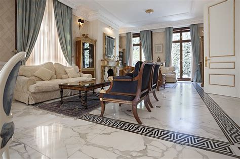 Diamond motifs simply lift the floor tile game in this living room is ...