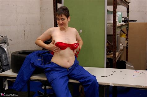 Amateur Woman Hotmilf Unveils Her Natural Tits While Stripping To A Red Thong Coedcherry